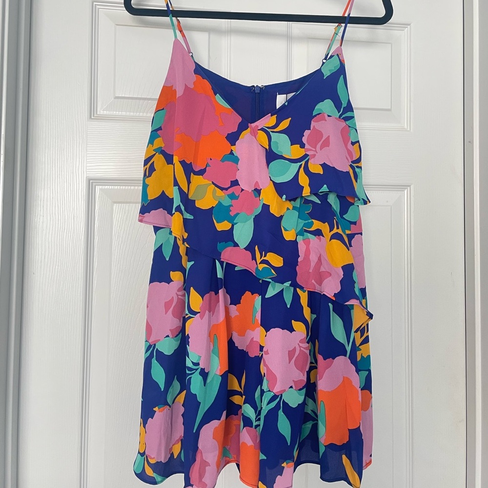 New with tags Sugarlips romper with pockets.